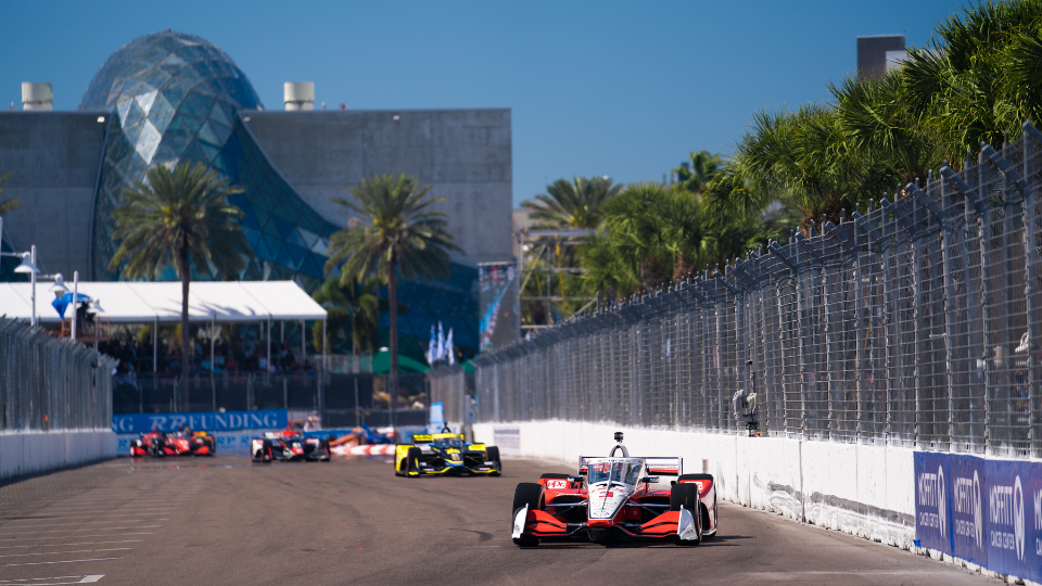 IndyCars speeding into turn 1 at the Firestone Grand Prix of St. Petersburg