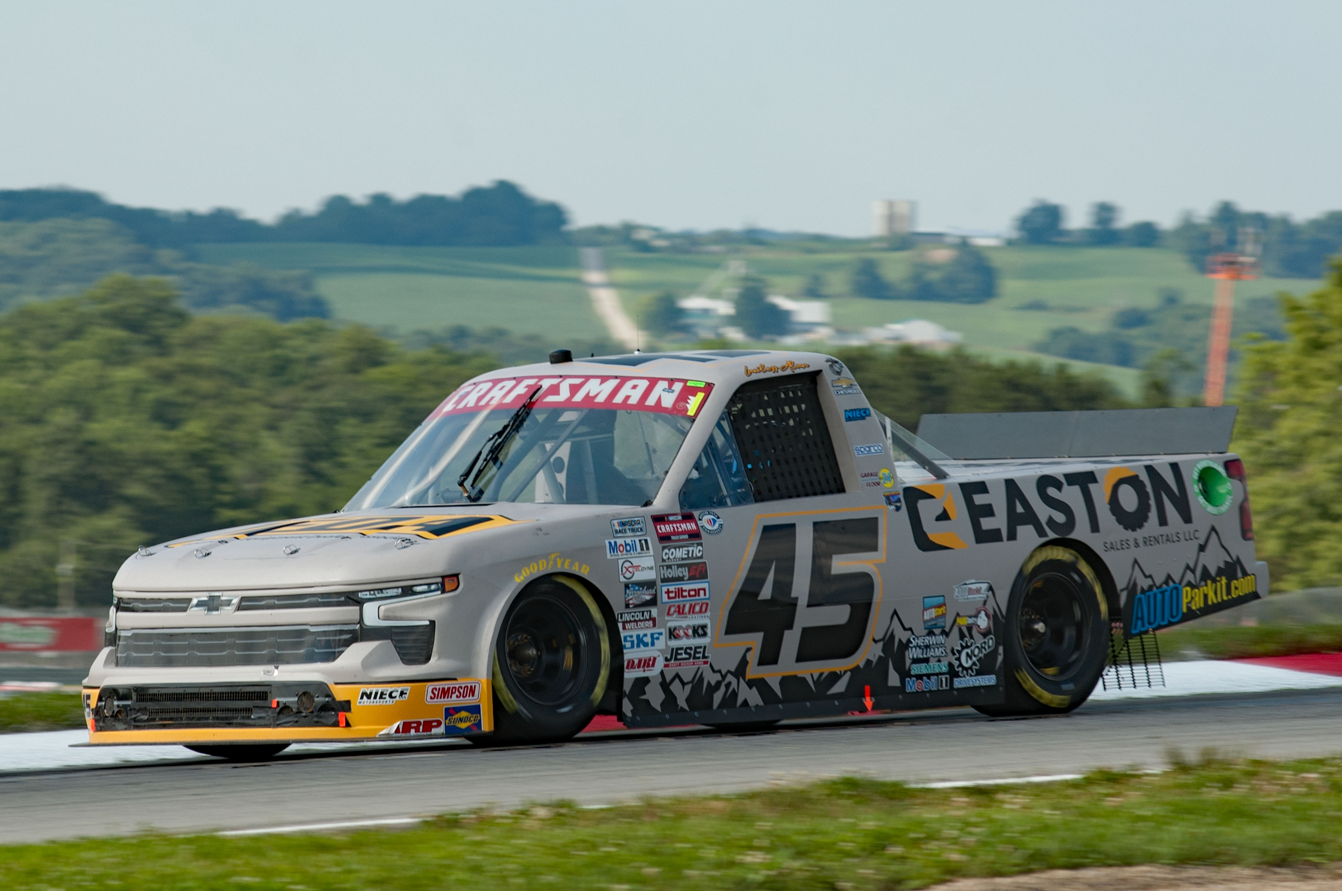 Pirelli World Challenge cars speeding through turn 1 at the Firestone Grand Prix of St. Petersburg